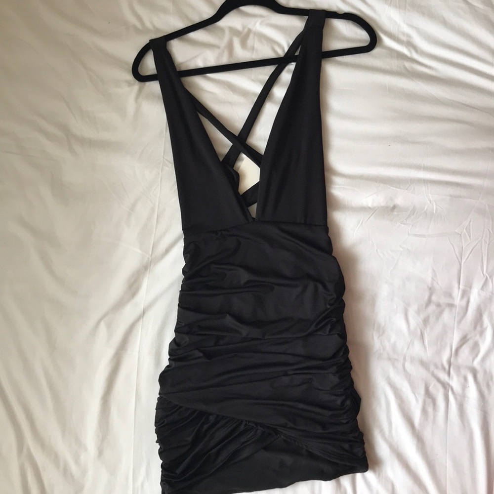 Low plunge black bodycon dress